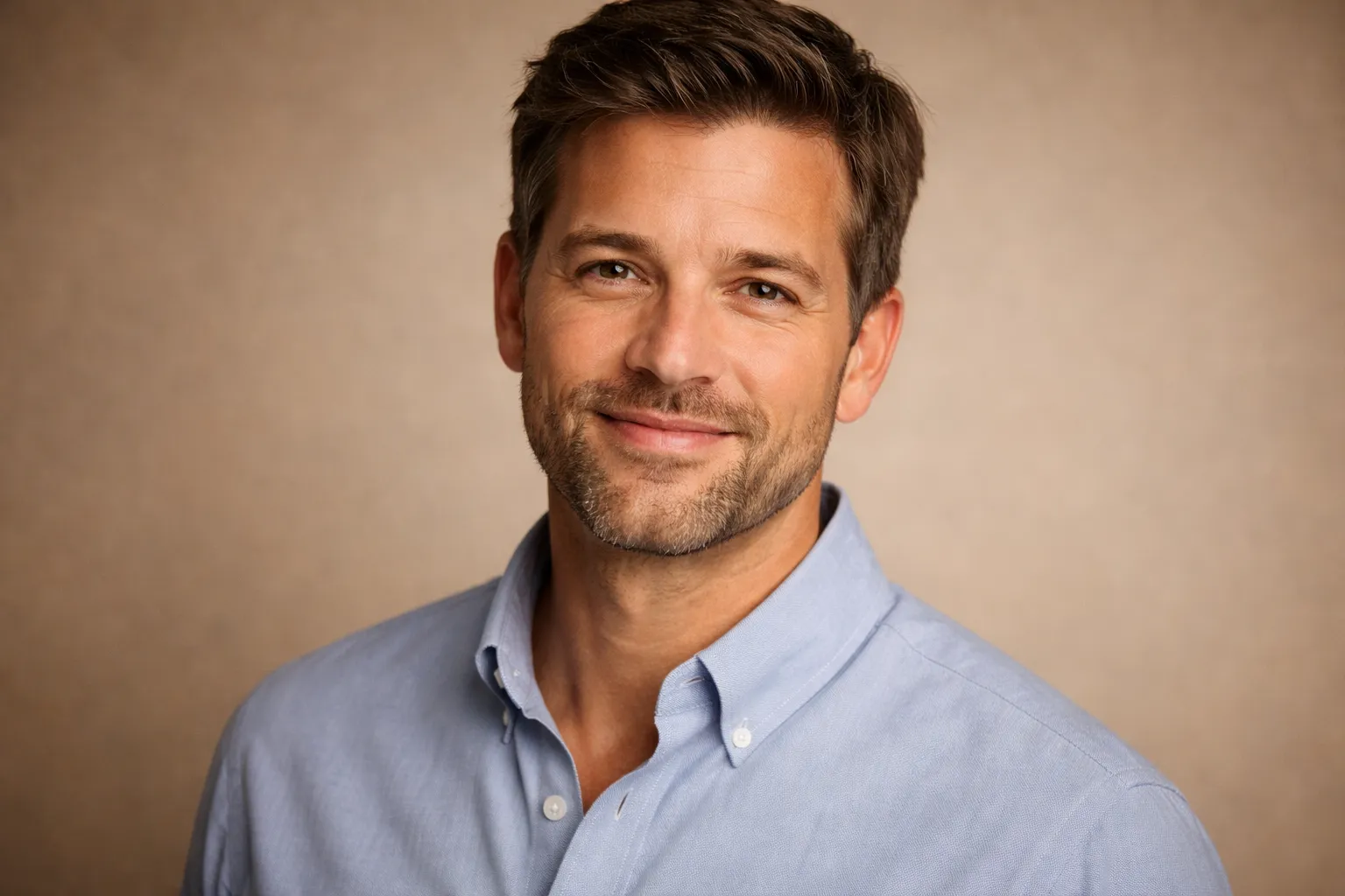 Portrait of a smiling man in his 40s showing precise age progression result