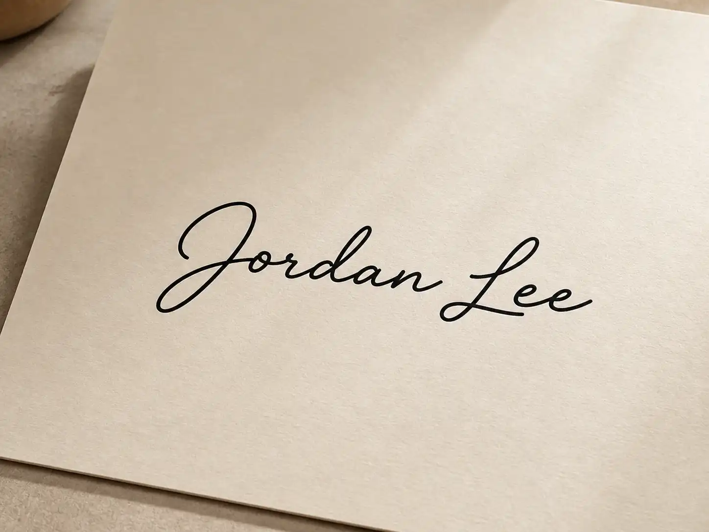 Jordan Lee rendered in a uniform cursive font on warm white paper